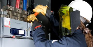 Technician working with safety gear on 